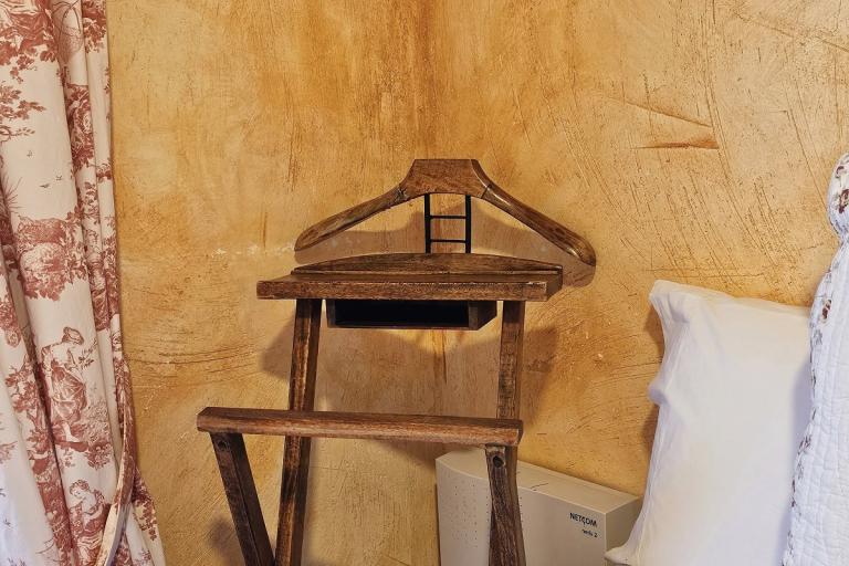 Orange room coat rack detail